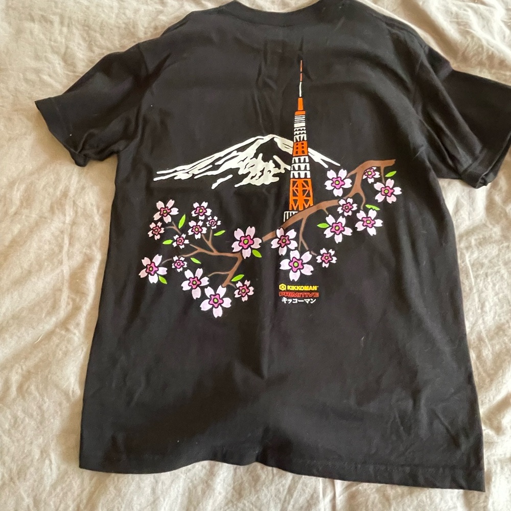 Black Graphic T-Shirt with Cherry Blossom and Tower Design from Kilimanjaro